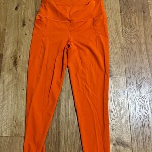 Calia orange leggings side pockets and back zipper pocket size L